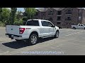 Used 2022 White Metallic FORD LARIAT 4WD SUPERCREW 5.5' BOX video 1