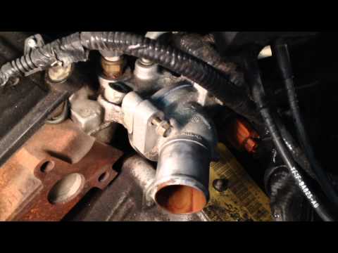 how to drain radiator 2001 ford taurus