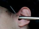 tragus piercing by HeinZ
