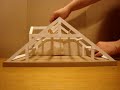Concepts pour diviser un espace sous les combles en deux zones distinctes, par une cloison souple du type store à enrouleur... La vidéo présente une maquette de charpente, réalisée en carton-mousse.