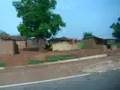 Views along the road in Ghana with mud huts