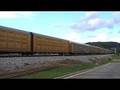 CEFX 3120 Leads CSX Q210, Autorack, at South Tunnel Hill