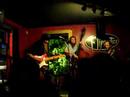 the eric hokkanen trio (eric hokkanen, lead; ryan gould,  bass; rick, drums) with friends at flipnotics cafe in austin, tx on 7/18/06.