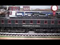 Big Liz starred in the very first video that I uploaded to YouTube, so it's only fitting that she get her own True HD 1080p video. In this video, I have her hauling a dozen Pennsy freight cars, though that's a pretty small load for such a large, powerful model. The prototype was built in 1917 as Pennsy's first experimental AC jack-shaft electric locomotive but was so powerful that it kept ripping out the couplers of the day and was finally relegated to pusher service. Since people seem to want to see other parts of my layout, I've done this video a bit differently. Big Liz normally resides in my locomotive ready yard, so I show her leaving the yard, proceeding through the interlocking plant and onto the Track 1 mainline. You then see her and her train in several run-bys and finally get to see her uncouple from her train and come back into the ready yard. Please visit my web site -- www.toytrains1.com -- for lots more videos and photos of both real and model trains.