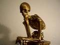 The Thinker skeleton statue -- Metallic Gold