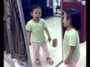 Ain Nyanyi depan cermin