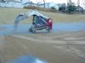 Takeuchi Skid Steer Spreading Stone