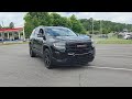 Used 2023 Ebony Twilight Metallic GMC SLE video 1