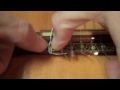 How to change the strings on a classical guitar - how to change a nylon string guitar