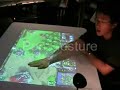 Multi User Warcraft III and Google Earth on a Table