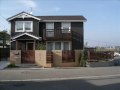 塗壁とウッドフェンスのある庭づくり／設計工房ひなたぼこ