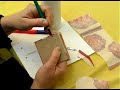 making a decoupage piggy bank : folding napkins inside a decoupage piggy bank