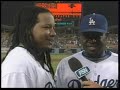 After Dodgers victory, Manny Ramirez translates for Angel Berroa during the post game interview