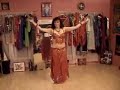 Dancing to Arabic music with finger cymbals, gypsy style.