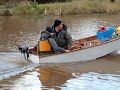 British Seagull pushing a Mirror Dinghy on Tiverton Canal