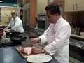 Martin Yan carves chicken in 18 secs.