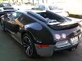 Quattre supercars qui font le plein a St Tropez Merceds Mclaren stirling moss, Lamborghini Reventon et l'unique Bugatti Veyron Gransport Grey Carbon,Rolls Roys Drophead (toutes ces supercars appartiennent à un seul proprietere)