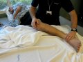 Quadriplegic Masi Sala improves his leg kicks during Physical Therapy