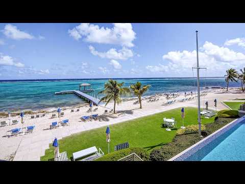 RUM POINT RESORT | RESIDENCE 203 BEACHFRONT CONDO