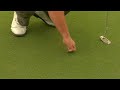 Golf Tips : How to Repair a Golf Ball Divot on the Putting Green