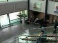 Electricians pushing up Wire Roll on stairs