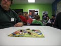 this game is pretty simple.  each player gets three surprisingly powerful magnets.  in order, players roll a die, then place a magnet on a snake who's color matches the die roll.  if you disturb any of the other magnets, such that they roll off the board or get stuck together, you take those magnets.  the first to get rid of all their magnets wins.