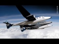 Add the NEW Sourcefed Facebook page: on.fb.me Ashton Kutcher will join the privileged few on the maiden voyage of Virgin Galactic. Read Sir Richard Branson's blog here: bit.ly Click the annotation or go to SourceFed.com for the 5 videos we post daily or anything we've ever made. Watch more of today's news youtube.com Philly D OFFICIAL APP: bit.ly Hosts: @elliottcmorgan @joebereta Music: @ronaldjenkees