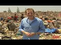 Boy scavenges for survival in Thai dump