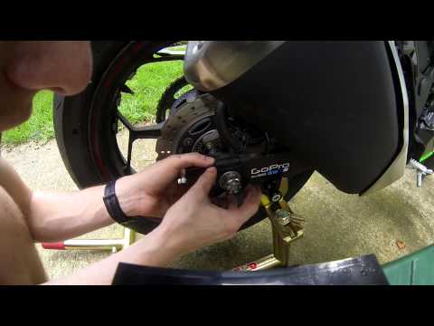 how to adjust a chain on a motorcycle