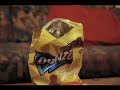 A man arrives home with a delicious bag of Doritos, plonking them on the table he leaves to tend to something else. Whilst away a tribe of Doritos escape from the packet to perform a quick sacrifice to the God of Salsa. the man returns interupting the ceremony, opening the pot of salsa he is confused to find a dorito already inside. Deciding his love for doritos outwieghs his suspicion the man devours the doritos. The Salsa God is appeased.