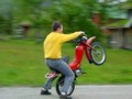 Hilarious moped wheelie Hilarious moped wheelie