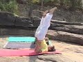 Soorya Raviji - yoga master in The Shoulderstand and The Plow form.