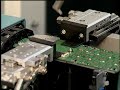STAUBLI ROBOT - INDUSTRIAL APPLICATION - CELL PHONE ASSEMBLY STAUBLI ROBOT - INDUSTRIAL APPLICATION - CELL PHONE ASSEMBLY