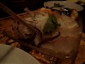 Poking a live squid before eating it