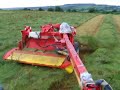 Pottinger prototype 307 c/w auto swather in action Pottinger prototype 307 c/w auto swather in action