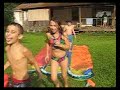 kiddos playing on water slide