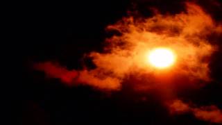 Sun and cirris clouds through heavy filter timelapse 2 V08392