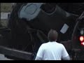 Throwing away toys, crushing them in a garbage truck