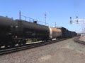 A Union Pacific Mixed Manifest Freight Train with an Army Tank and Mid-Train DPU charges through the Union Pacific/BNSF Interlocking Diamond in Stockton,California on Monday August 4th 2008 at 12:53PM PSTThanks For Watching and Enjoy!*Copyright USA Rail Productions 2008