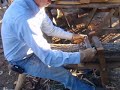 Kent Garrett demonstrates how to use a draw knife on a shave horse to make bench and table legs