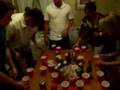 White kids playing Flip Cup