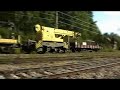 Railtruck with railcrane passes Kauppilanmäki station Railtruck with railcrane passes Kauppilanmäki station