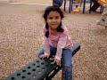 Eliana visit to Sabinal Texas school park riding seesaw. Sabinal population of around 1600 people.