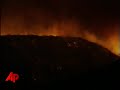 a nearly 1,000-acre wildfire on a camp pendleton explosives range has been contained without causing any injuries or damage to buildings on the southern california base. (oct. 9)