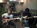 me and friend play guitar(i am in dark shirt on the right.) ^!^please rate, and comment.-rock on-