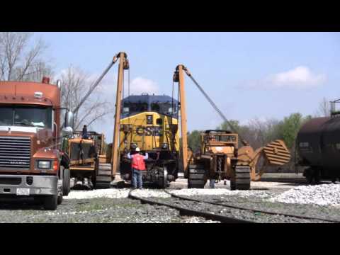 CSX locomotive - CSX 612's traction motor gets taken out and an idler axler put in so the locomotive can make it to the shop. Work was done in Alice yard at Vincennes, IN. Th...