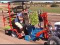 La nueva  trasplantadora OMIA puede trasplantar plantas en alvéolo (cilìndricas, cònicas, y piràmidales) en particular sobre un terreno a baùl. Tiene un rendimiento horario de unas 8000 plantas con dos operadores, tiene un sistema de guia automatica que sigue el surco de los baules del terreno o la estela que dejan las ruedas ; se puede efectuar también un trasplanto màs delicado como por ejemplo lo de ensalada, apio, scelga, hinojo, y todas las ortalizas que no superan los 15 cm de alteza. Se puede regular en calzada (desde un mìnimo de 75 cm hace 1 metro), sobre la fila (desde 30 cm hace 1 metro), interfila (desde 7cm hace 80 centìmetros ). Es muy indicada para trabajar sobre un terreno hùmedo porquè es muy ligera (750 kilogramos). Trabaja bien tambièn sobre instalaciòn de riego a gota o con pequenos irrigadores que se montan antes para regar después del trasplante. Puede ser utilizada sobretodo en pequenas y medias empresas o pequenas parcelas.Remolcada para una motoazada de 14hp, que se puede destacar y emplear de otra manera, se utiliza para sembrar habas, guisantes, ajo, etc.Si se cambian los elementos podemos quedarnos còmodamente sentados sobre la màquina y utilizarla como sembradora de precisiòn para ortalizas. Todos los comandos estàn a disposiciòn del operador ( el que rellena el distribuidor con las plantas) de manera que  no deja su asiento. Hay una reserva de 26 contenedores de plantas.THE OIL- DYNAMIC HALF-MOVABLE TRANSPLANTER WITH AUTOPILOTThe new transplanter OMIA can transplant the alveolus of little plants (cylindricals, conicals, pyramidals) over a raised soil. It can yield 8000 plants per hour with only two workers. It has an automatic driver system that marks the furrow of soil's rises or the tracks. It is suitable for the delicate transplant of salad, celery, beet,fennel and any kind of vegetables that isn't higher than 15 cm. It could be settled on the track ( from 75cm to 1m), on the line (from 30 cm to 1m) and on the interline (from 7cm to 80cm). It is advisable for moist earth because it weighs only 750 kg.It works with drop's irrigation system or with pre-settled mini-irrigators that can water straight after the transplant. It could be used in little or middle farms or little plots of land.If you drag it with a 14hp motor-hoe that can be removed, you'll sow beans,  peas, garlic, etc.If you change the elements  it could be used like a precision sower for vegetables so you remaine sit there. The operator (that fill in the distributor with the plants) can used all the controls without getting out or moving himself. This transplanter has a reserve of 26 containers of plants