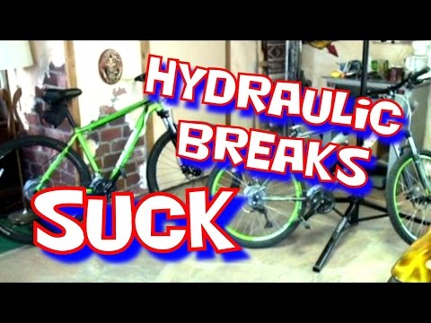 how to adjust hydraulic brakes on a bike