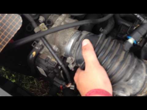 How to Install a K&N air filter on a Mazda 3 2004 hatchback.