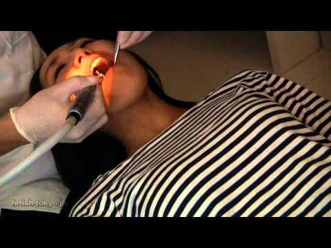dental fetish - Sexy chick gets teeth cleaned by a real dentist. SFW!